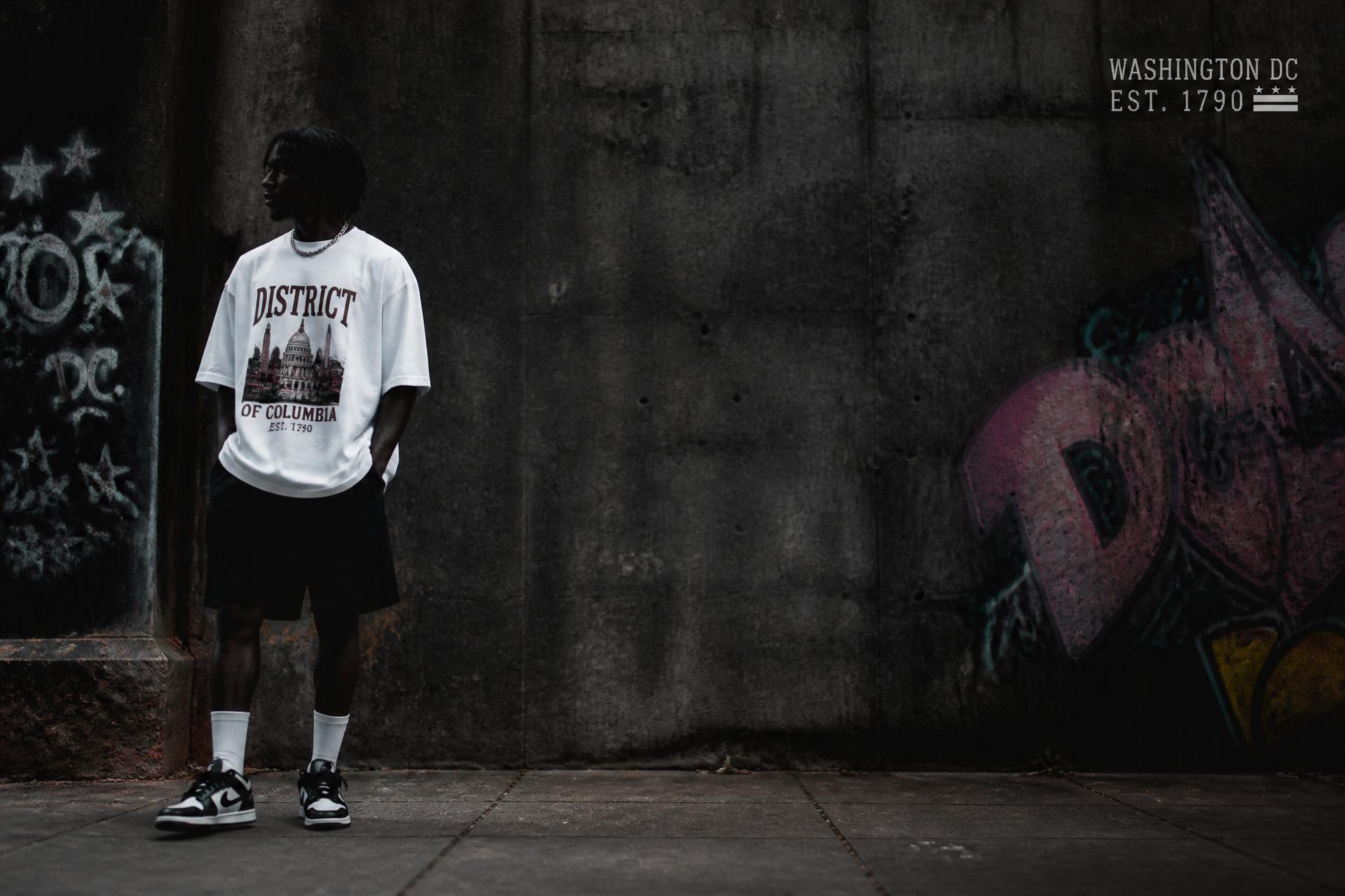 Streetwear look photographed against a graffiti wall in Washington DC